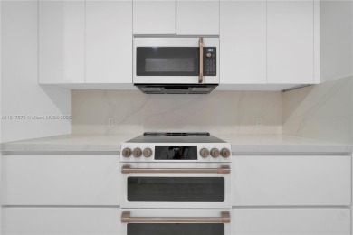 The largest 2-bed, 2-bath corner apartment in the building on Flamingo Lakes Country Club in Florida - for sale on GolfHomes.com, golf home, golf lot