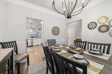 Welcome to 106 Coosa Lane, an elegant end unit townhome in the on Cobbs Glen Country Club in South Carolina - for sale on GolfHomes.com, golf home, golf lot