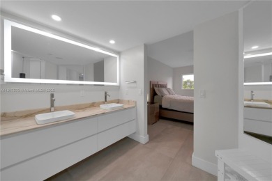 The largest 2-bed, 2-bath corner apartment in the building on Flamingo Lakes Country Club in Florida - for sale on GolfHomes.com, golf home, golf lot