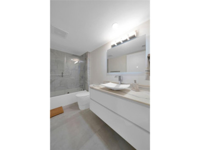 The largest 2-bed, 2-bath corner apartment in the building on Flamingo Lakes Country Club in Florida - for sale on GolfHomes.com, golf home, golf lot