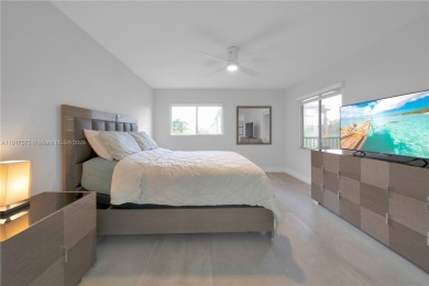 The largest 2-bed, 2-bath corner apartment in the building on Flamingo Lakes Country Club in Florida - for sale on GolfHomes.com, golf home, golf lot