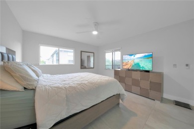 The largest 2-bed, 2-bath corner apartment in the building on Flamingo Lakes Country Club in Florida - for sale on GolfHomes.com, golf home, golf lot