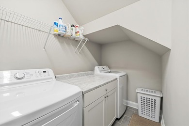 Welcome to 106 Coosa Lane, an elegant end unit townhome in the on Cobbs Glen Country Club in South Carolina - for sale on GolfHomes.com, golf home, golf lot