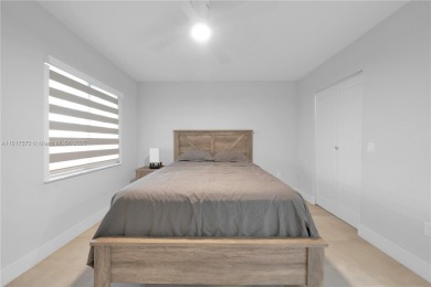 The largest 2-bed, 2-bath corner apartment in the building on Flamingo Lakes Country Club in Florida - for sale on GolfHomes.com, golf home, golf lot