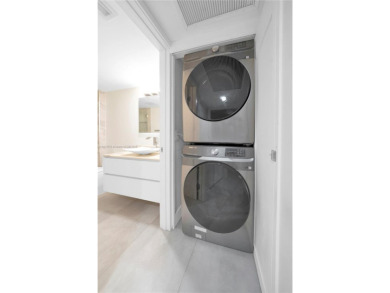 The largest 2-bed, 2-bath corner apartment in the building on Flamingo Lakes Country Club in Florida - for sale on GolfHomes.com, golf home, golf lot