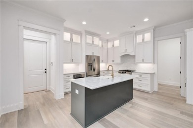 This Highland Oaks golf cottage is a must see! The floorplan is on Grand National Golf Course in Alabama - for sale on GolfHomes.com, golf home, golf lot