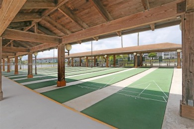 The largest 2-bed, 2-bath corner apartment in the building on Flamingo Lakes Country Club in Florida - for sale on GolfHomes.com, golf home, golf lot