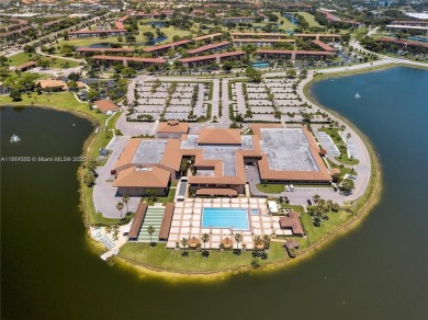 The largest 2-bed, 2-bath corner apartment in the building on Flamingo Lakes Country Club in Florida - for sale on GolfHomes.com, golf home, golf lot