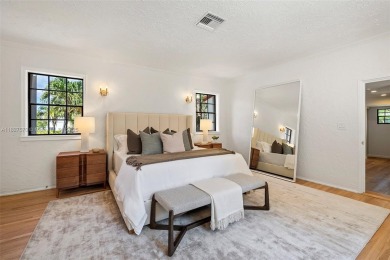 Stunning mediterranean mansion exuding elegance and beach vibes on Miami Beach Golf Club in Florida - for sale on GolfHomes.com, golf home, golf lot