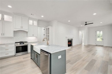 This Highland Oaks golf cottage is a must see! The floorplan is on Grand National Golf Course in Alabama - for sale on GolfHomes.com, golf home, golf lot