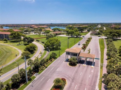 The largest 2-bed, 2-bath corner apartment in the building on Flamingo Lakes Country Club in Florida - for sale on GolfHomes.com, golf home, golf lot