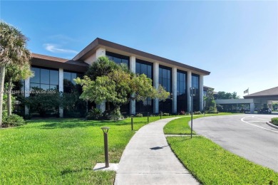 The largest 2-bed, 2-bath corner apartment in the building on Flamingo Lakes Country Club in Florida - for sale on GolfHomes.com, golf home, golf lot