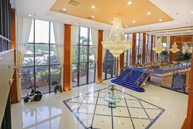 The largest 2-bed, 2-bath corner apartment in the building on Flamingo Lakes Country Club in Florida - for sale on GolfHomes.com, golf home, golf lot