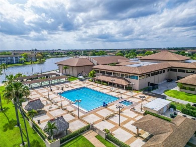 The largest 2-bed, 2-bath corner apartment in the building on Flamingo Lakes Country Club in Florida - for sale on GolfHomes.com, golf home, golf lot