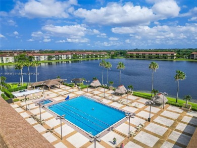 The largest 2-bed, 2-bath corner apartment in the building on Flamingo Lakes Country Club in Florida - for sale on GolfHomes.com, golf home, golf lot