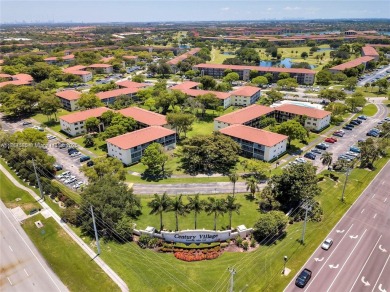 The largest 2-bed, 2-bath corner apartment in the building on Flamingo Lakes Country Club in Florida - for sale on GolfHomes.com, golf home, golf lot