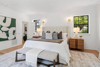 Stunning mediterranean mansion exuding elegance and beach vibes on Miami Beach Golf Club in Florida - for sale on GolfHomes.com, golf home, golf lot