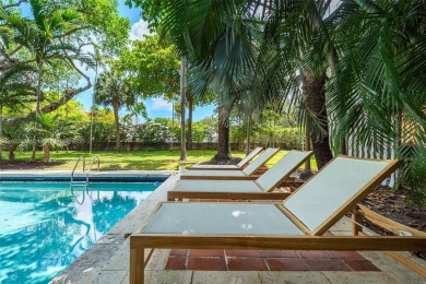 Stunning mediterranean mansion exuding elegance and beach vibes on Miami Beach Golf Club in Florida - for sale on GolfHomes.com, golf home, golf lot