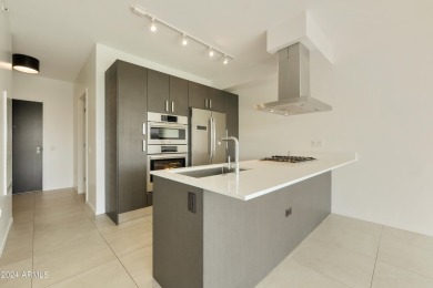 Indulge in the epitome of luxury living at 7120 Optima Kierland on Kierland Golf Club in Arizona - for sale on GolfHomes.com, golf home, golf lot