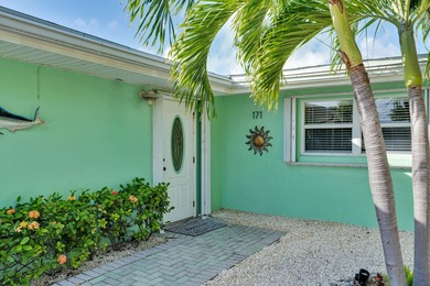 Experience the best of Keys living in this immaculate 2-bedroom on Key Colony Beach Golf Course in Florida - for sale on GolfHomes.com, golf home, golf lot
