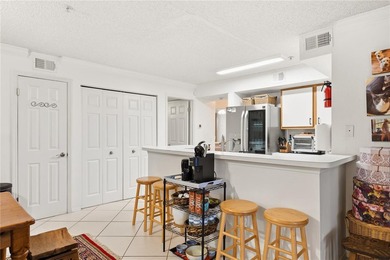 Beautifully maintained End-Unit Condo with Golf Course Views in on Feather Sound Country Club in Florida - for sale on GolfHomes.com, golf home, golf lot