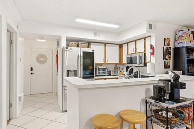 Beautifully maintained End-Unit Condo with Golf Course Views in on Feather Sound Country Club in Florida - for sale on GolfHomes.com, golf home, golf lot