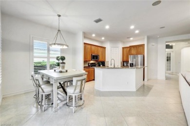 Nestled in the heart of Estero, this stunning 2-bedroom plus den on Wildcat Run Golf and Country Club in Florida - for sale on GolfHomes.com, golf home, golf lot