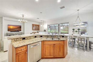 Nestled in the heart of Estero, this stunning 2-bedroom plus den on Wildcat Run Golf and Country Club in Florida - for sale on GolfHomes.com, golf home, golf lot