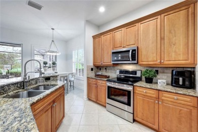 Nestled in the heart of Estero, this stunning 2-bedroom plus den on Wildcat Run Golf and Country Club in Florida - for sale on GolfHomes.com, golf home, golf lot