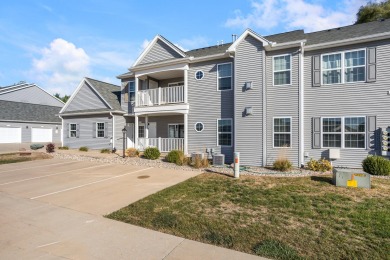 Looking for a first-floor condo with an attached garage that on Stone Creek Golf Club in Illinois - for sale on GolfHomes.com, golf home, golf lot