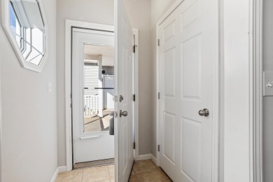 Looking for a first-floor condo with an attached garage that on Stone Creek Golf Club in Illinois - for sale on GolfHomes.com, golf home, golf lot