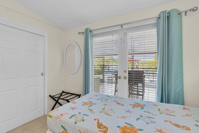 Experience the best of Keys living in this immaculate 2-bedroom on Key Colony Beach Golf Course in Florida - for sale on GolfHomes.com, golf home, golf lot