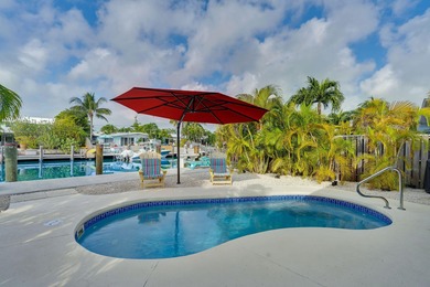 Experience the best of Keys living in this immaculate 2-bedroom on Key Colony Beach Golf Course in Florida - for sale on GolfHomes.com, golf home, golf lot