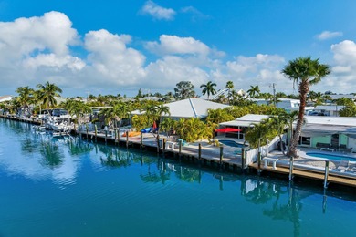 Experience the best of Keys living in this immaculate 2-bedroom on Key Colony Beach Golf Course in Florida - for sale on GolfHomes.com, golf home, golf lot