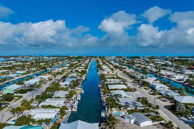 Experience the best of Keys living in this immaculate 2-bedroom on Key Colony Beach Golf Course in Florida - for sale on GolfHomes.com, golf home, golf lot