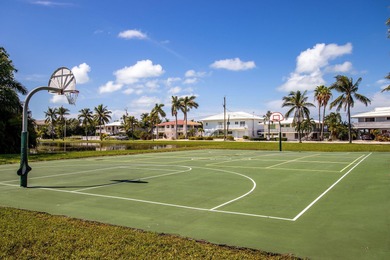Experience the best of Keys living in this immaculate 2-bedroom on Key Colony Beach Golf Course in Florida - for sale on GolfHomes.com, golf home, golf lot
