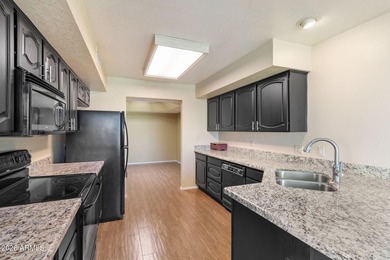 Move-in-ready home located in the highly desired golf community on Westbrook Village Golf Club in Arizona - for sale on GolfHomes.com, golf home, golf lot