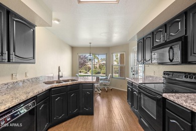 Move-in-ready home located in the highly desired golf community on Westbrook Village Golf Club in Arizona - for sale on GolfHomes.com, golf home, golf lot