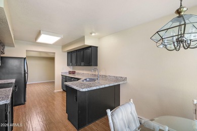 Move-in-ready home located in the highly desired golf community on Westbrook Village Golf Club in Arizona - for sale on GolfHomes.com, golf home, golf lot