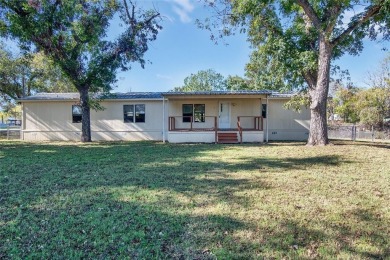 Tranquil 3-Bed, 2-Bath Home on 1.47 Acres in Horseshoe Bend - on Horseshoe Bend Country Club in Texas - for sale on GolfHomes.com, golf home, golf lot