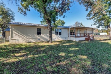 Tranquil 3-Bed, 2-Bath Home on 1.47 Acres in Horseshoe Bend - on Horseshoe Bend Country Club in Texas - for sale on GolfHomes.com, golf home, golf lot