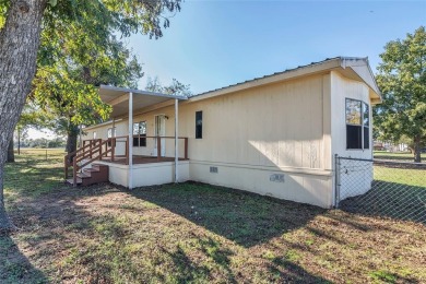 Tranquil 3-Bed, 2-Bath Home on 1.47 Acres in Horseshoe Bend - on Horseshoe Bend Country Club in Texas - for sale on GolfHomes.com, golf home, golf lot