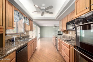 Beautifully maintained single-story home at the head of Sun City on Union Hills Country Club in Arizona - for sale on GolfHomes.com, golf home, golf lot