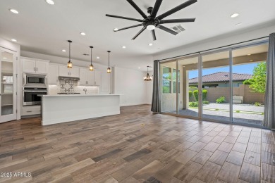 ENJOY RESORT STYLE LIVING DAILY AT THIS GATED (GUARD POST) on Sterling Grove Golf & Country Club in Arizona - for sale on GolfHomes.com, golf home, golf lot