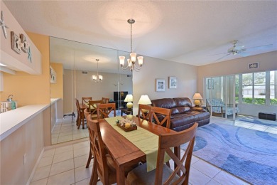 Welcome to this bright and airy first-floor condo in the on Peridia Golf and Country Club in Florida - for sale on GolfHomes.com, golf home, golf lot