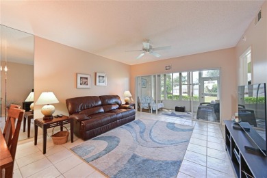 Welcome to this bright and airy first-floor condo in the on Peridia Golf and Country Club in Florida - for sale on GolfHomes.com, golf home, golf lot