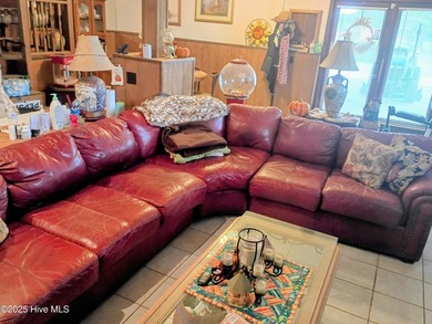 This is a great country house to accommodate a single family or on Land-O-Lakes Golf Course in North Carolina - for sale on GolfHomes.com, golf home, golf lot