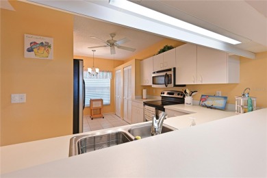 Welcome to this bright and airy first-floor condo in the on Peridia Golf and Country Club in Florida - for sale on GolfHomes.com, golf home, golf lot