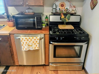 This is a great country house to accommodate a single family or on Land-O-Lakes Golf Course in North Carolina - for sale on GolfHomes.com, golf home, golf lot