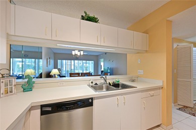 Welcome to this bright and airy first-floor condo in the on Peridia Golf and Country Club in Florida - for sale on GolfHomes.com, golf home, golf lot